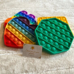 Pop Fidget toys set of 4 in cloth gift bag.  Multicolored. Push pop bubbles NWT